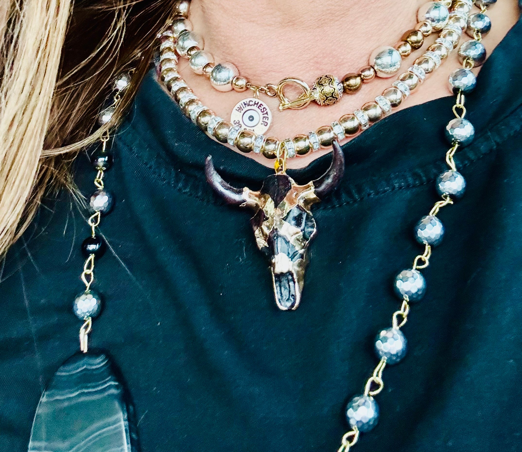 Silver Hematite Necklace with Black and Gold Wrapped Bull Pendent