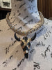 Silver Hematite Necklace with Black and Gold Wrapped Bull Pendent