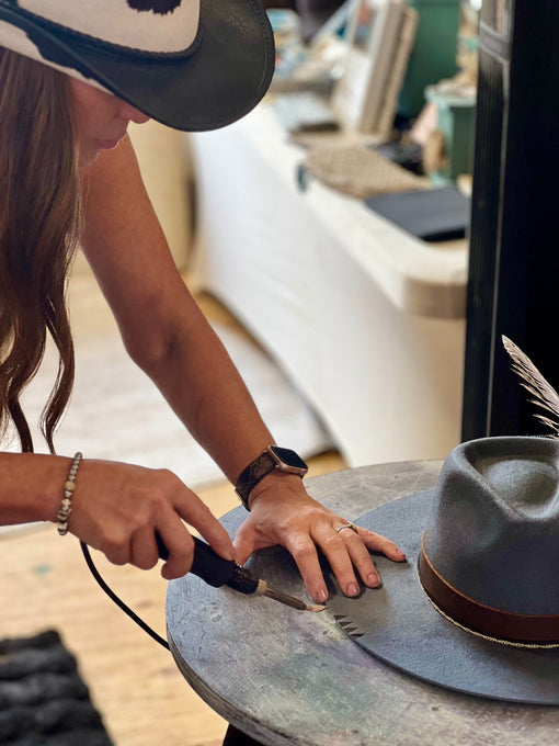 Custom hat burning design on wool felt hat by The VinHaus Hat Bar Texas